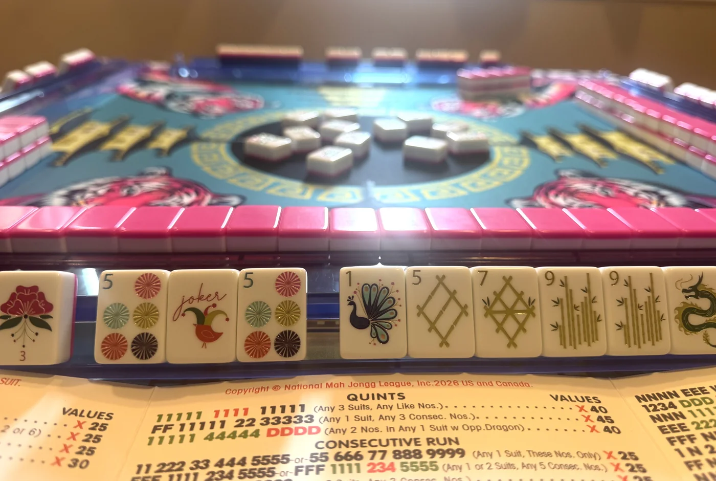 An elegant mahjong table set for a game at Mahjong Social House